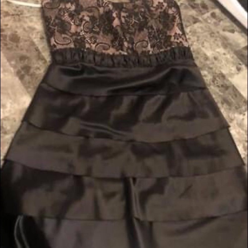 Brand new with tags paid 79.99 black and soft pink colour ..silky material